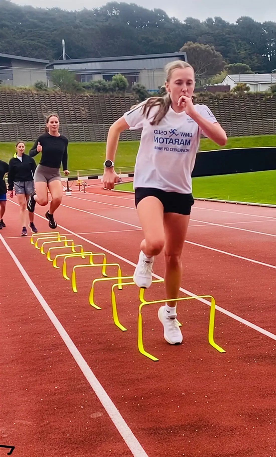 Athlete performing speed and agility hurdle drills at Newtown Park, Wellington